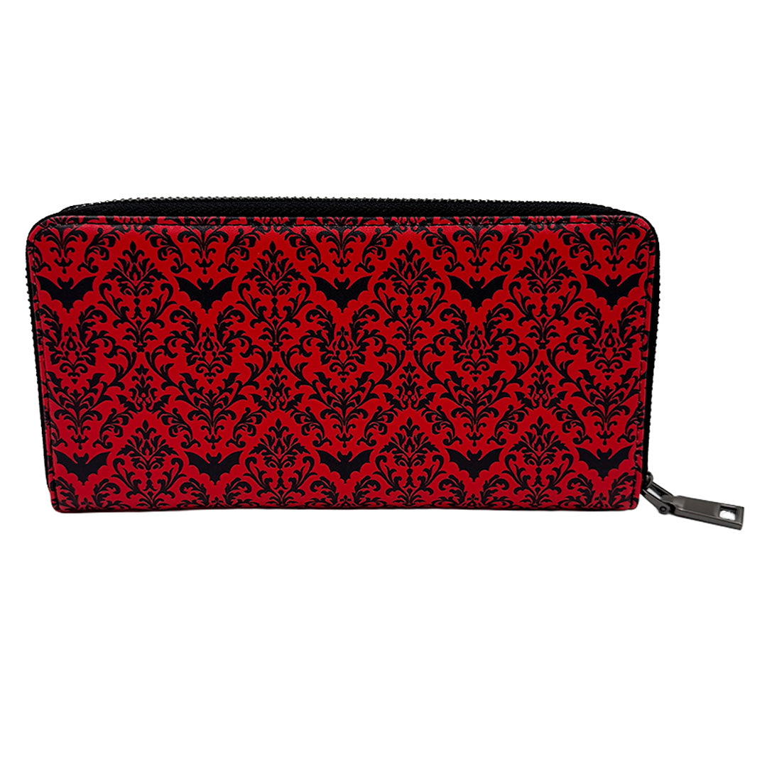 Red and black patterned wallet with a zipper on a white background