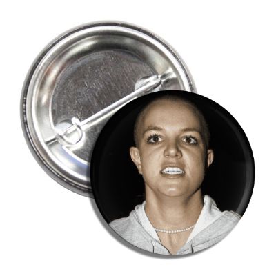 A collectible button featuring an image of Britney Spears.