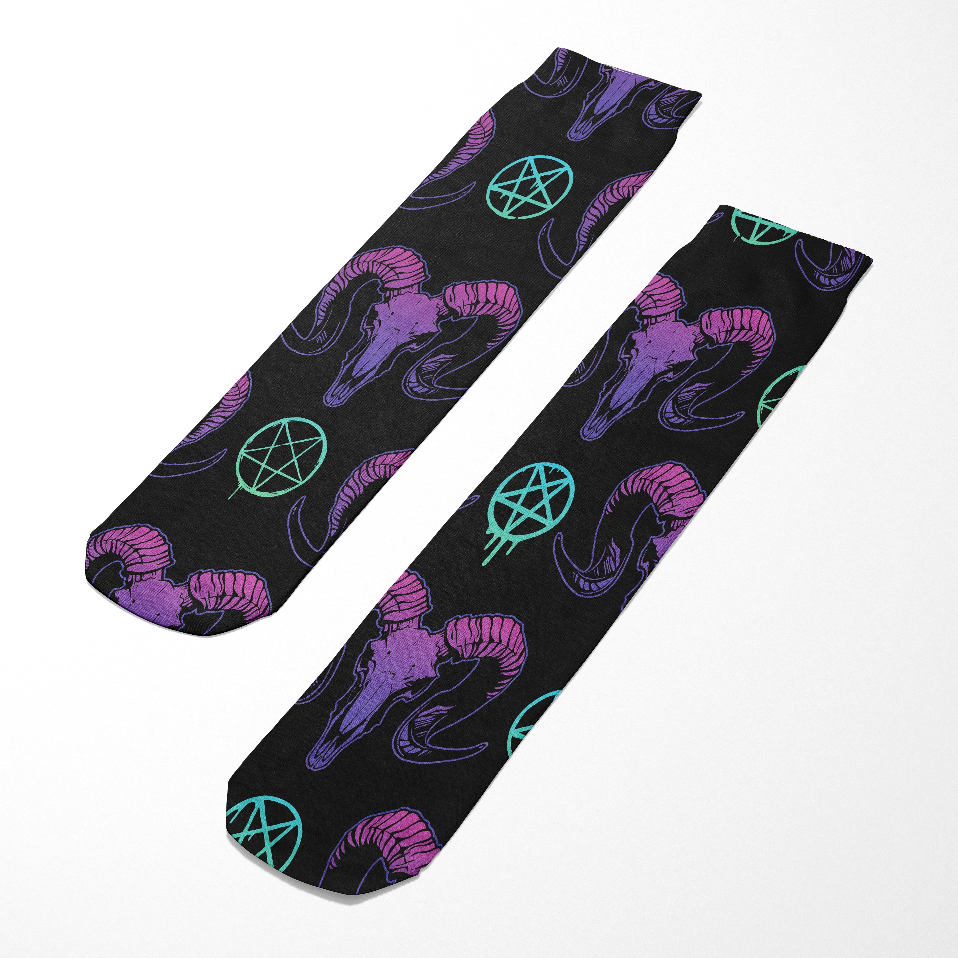 Black socks with purple ram heads and green pentagrams on a white background