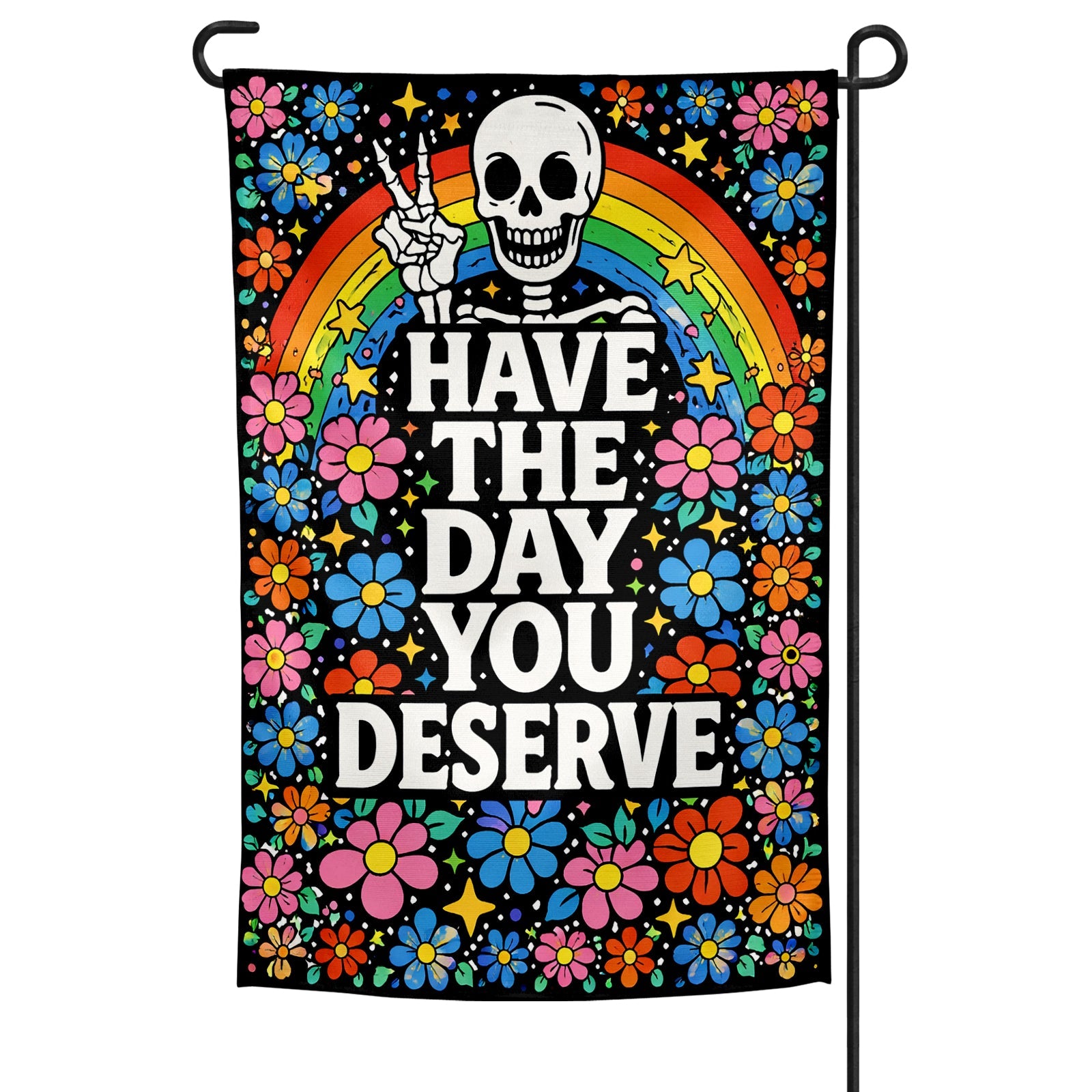 Colorful garden flag with skeleton, rainbow, and flowers, featuring text 'Have the Day You Deserve'.
