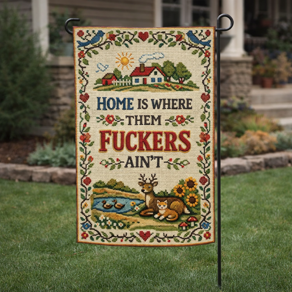 Decorative garden flag with nature-themed design and text on a grassy lawn.