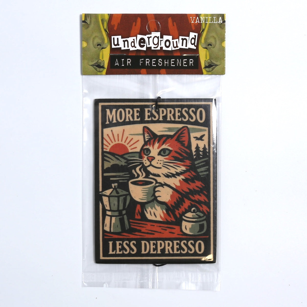 Air freshener packaging with a cat illustration and text 'More Espresso Less Depresso'.