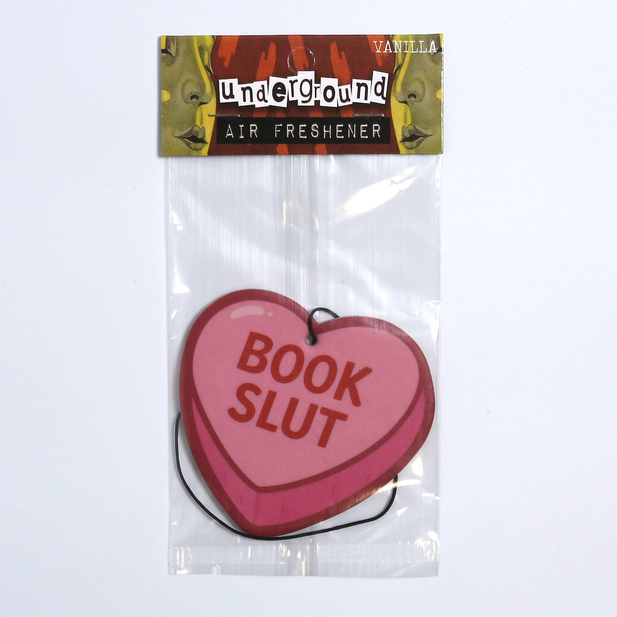 Heart-shaped air freshener with 'BOOK SLUT' text, branded 'Underground', on a clear background.