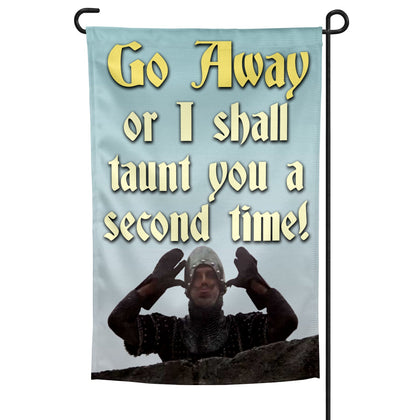 A garden flag featuring a character from Monty Python with the phrase 'Go Away or I shall taunt you a second time!' printed on it.