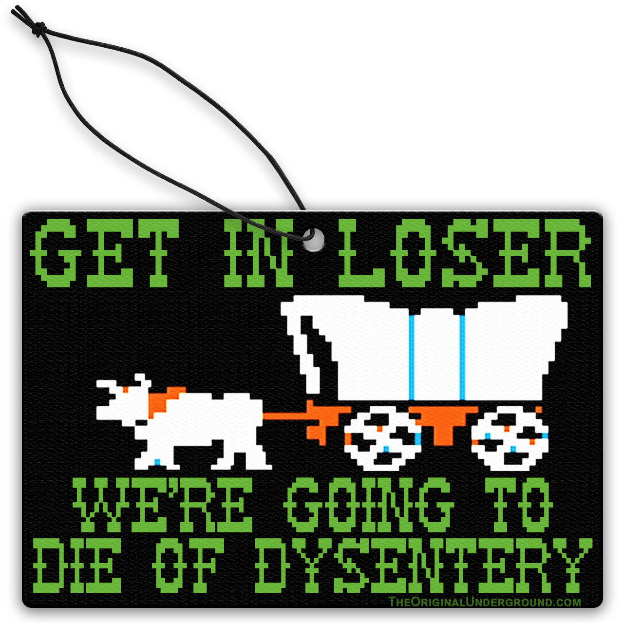 A black air freshener with a humorous phrase 'GET IN LOSER WE'RE GOING TO DIE OF DYSENTERY' printed in green and white, depicting an illustration of a covered wagon and a stick figure.